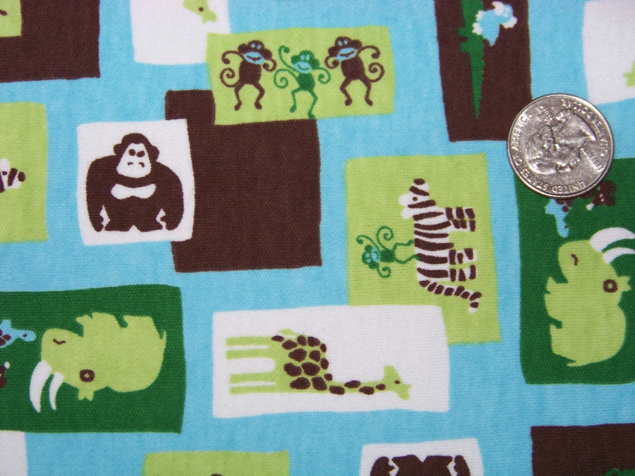 Mint Chocolate Zoo  by the inch.   52” Wide